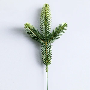 Artificial pine branch Christmas decor lifelike faux pine sprig for wreaths centerpieces and holiday arrangements durable maintenance-free festive greenery.